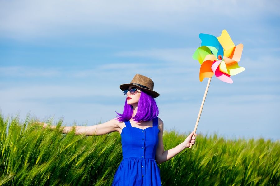 Young Woman With Wind Toy