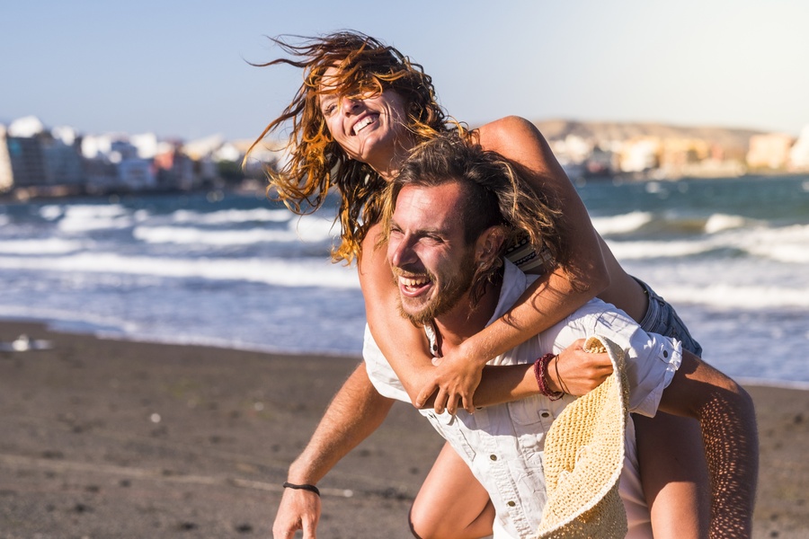 Beautiful Couple Of Adults Having Fun Together